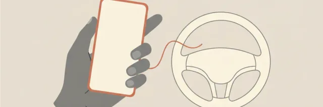 A single muted mobile phone held loosely beside a pale steering wheel silhouette, flat vector illustration.