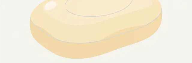 A single bar of soap resting on a pale surface, viewed from above, flat vector illustration in muted tones.