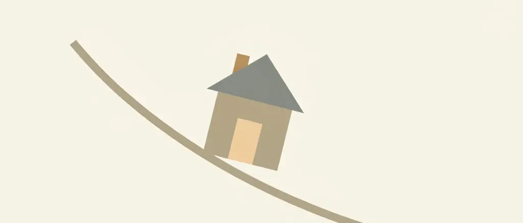 A single small house icon tilting on a downward-sloping line, muted grey and amber tones, flat vector illustration.