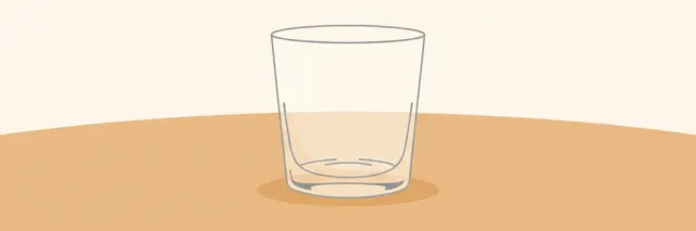 A single empty tumbler glass sitting on a muted sand surface, flat vector illustration.