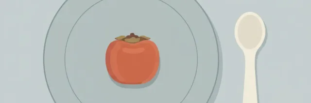 A single small round grape resting on a pale grey-blue plate beside a child-sized spoon, flat vector illustration, viewed from directly above.