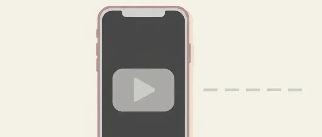 A single muted smartphone screen showing a small play-button icon, resting flat on a pale surface with a faint lane-marker stripe beside it, flat vector illustration.